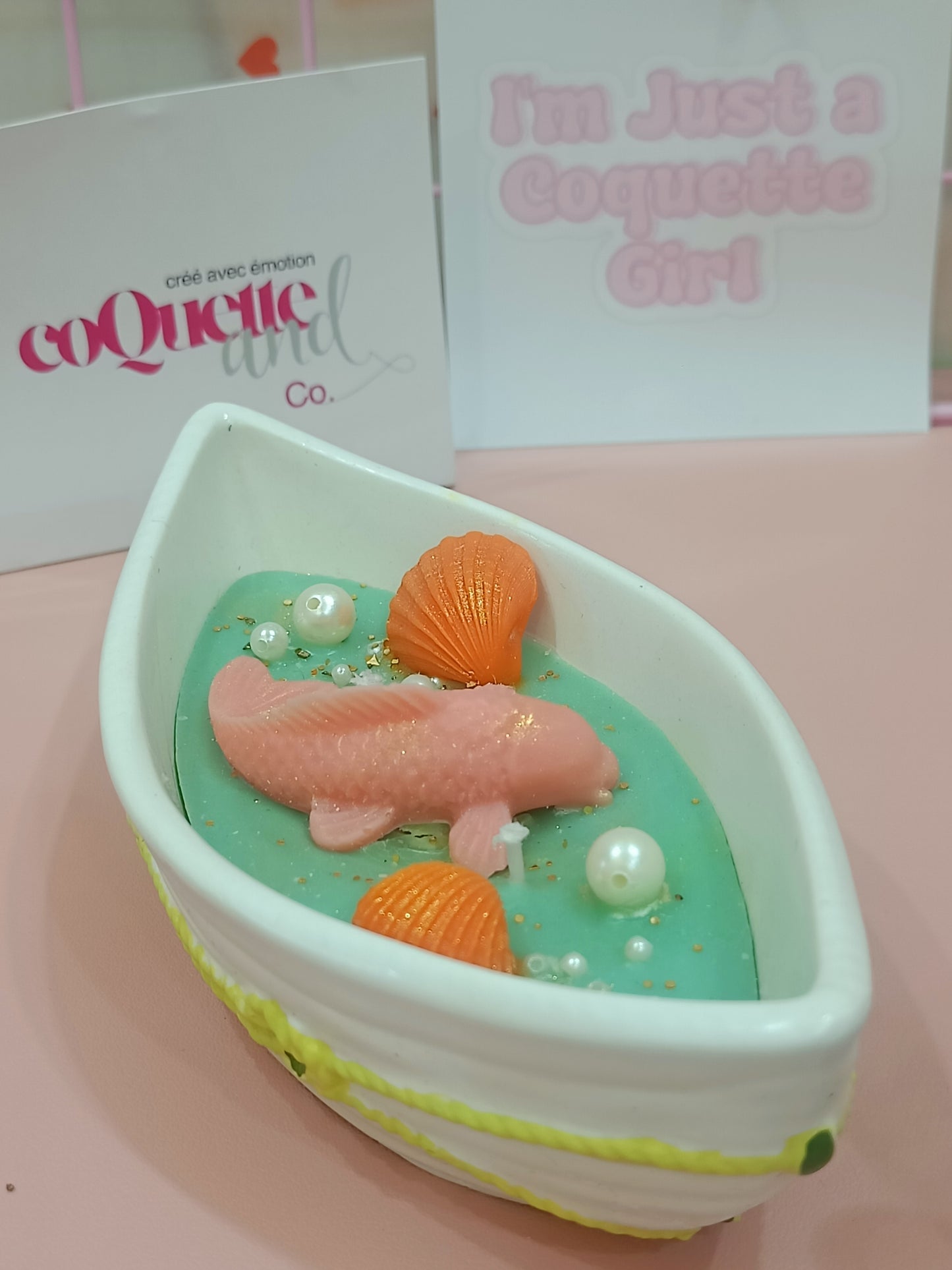 Fish on a boat with ceramic container