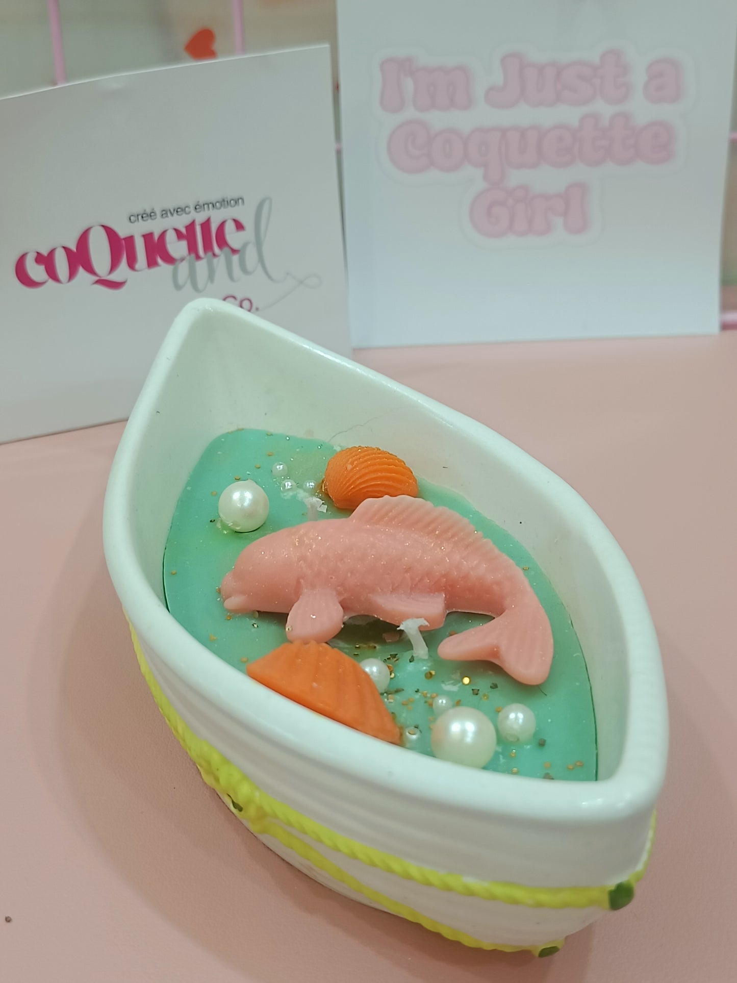 Fish on a boat with ceramic container